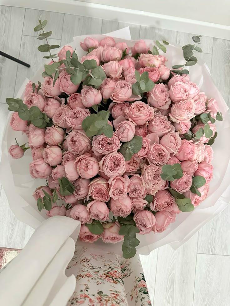 Center Flow Bright workshop space where corporate flower arrangements are designed and prepared for business delivery